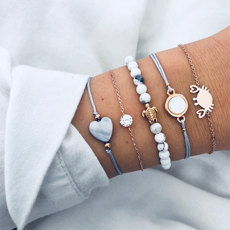 Ensemble de bracelets bleu clair avec tons marbrés et breloques animaux Ibiza Vibe