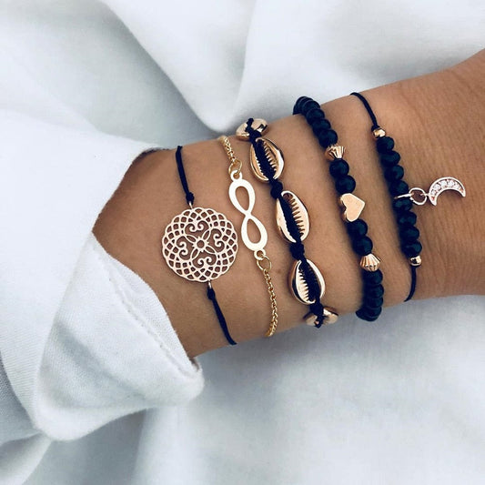 Ensemble de bracelets noirs avec coquillages dorés Ibiza Vibe