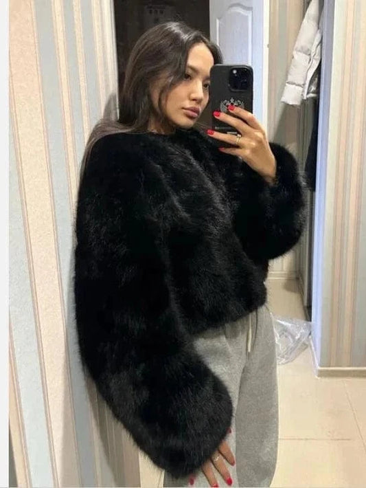 Manteau en fourrure noire et duveteuse Ibiza Vibe